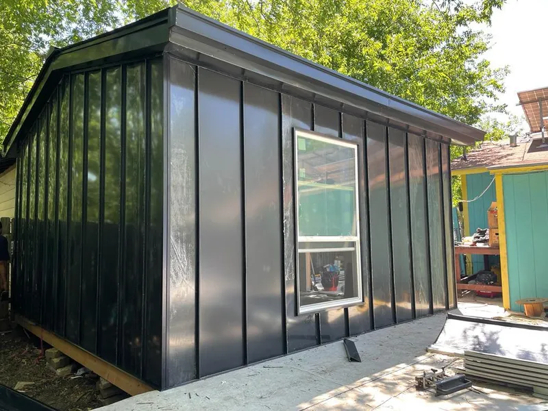 Black standing seam metal wall panels for Roof Inspection in Marinette