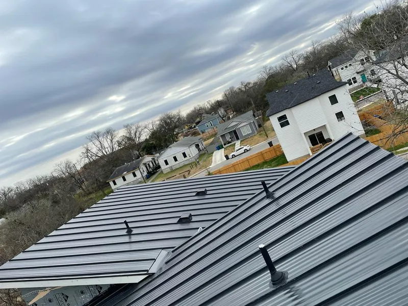 Standing seam metal roof panels with vents for Skylight Repair in Marinette